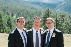 Groomsmen in black tux and boutonnieres