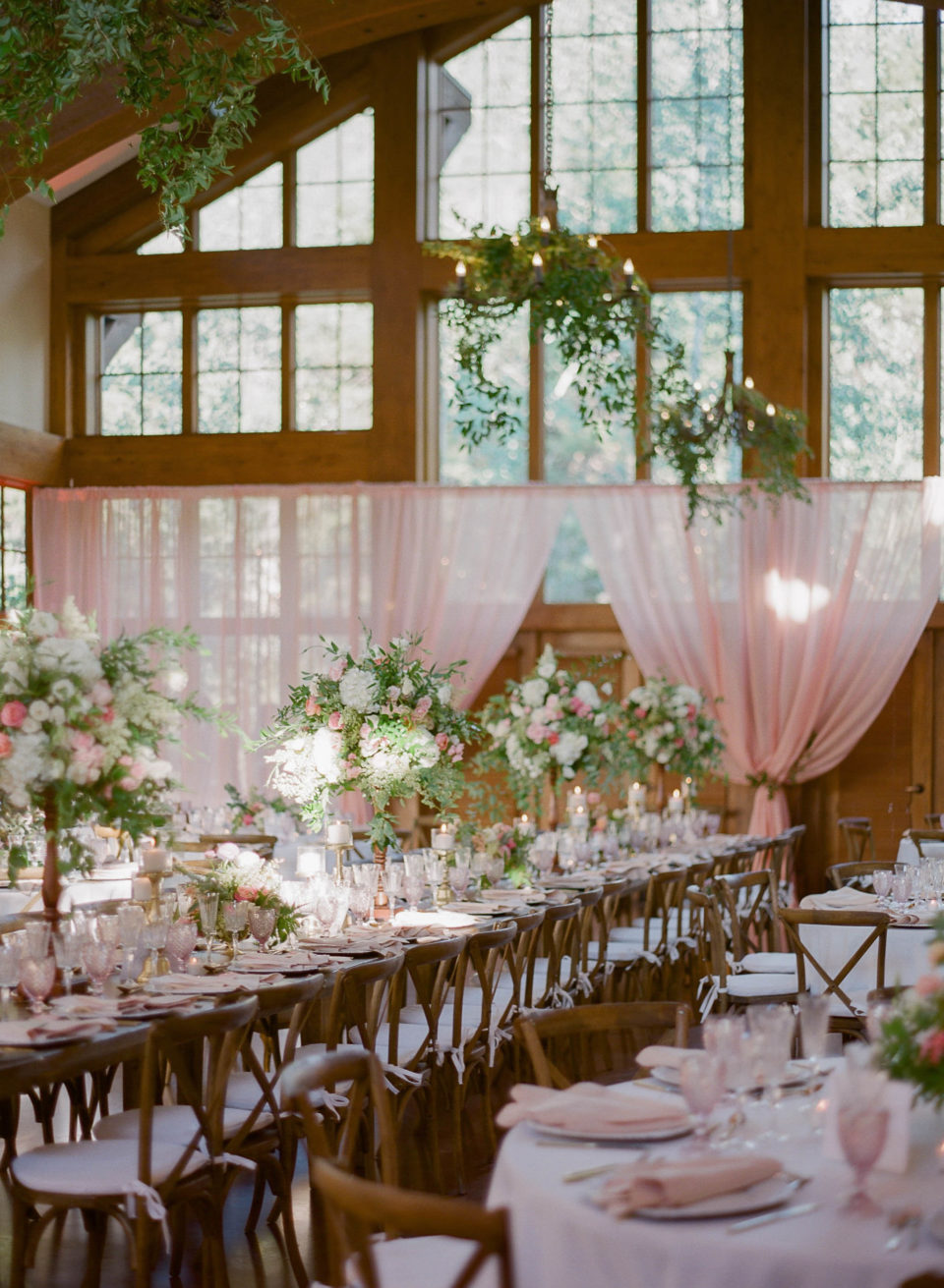 Pink Drape Farm Table Wedding Reception