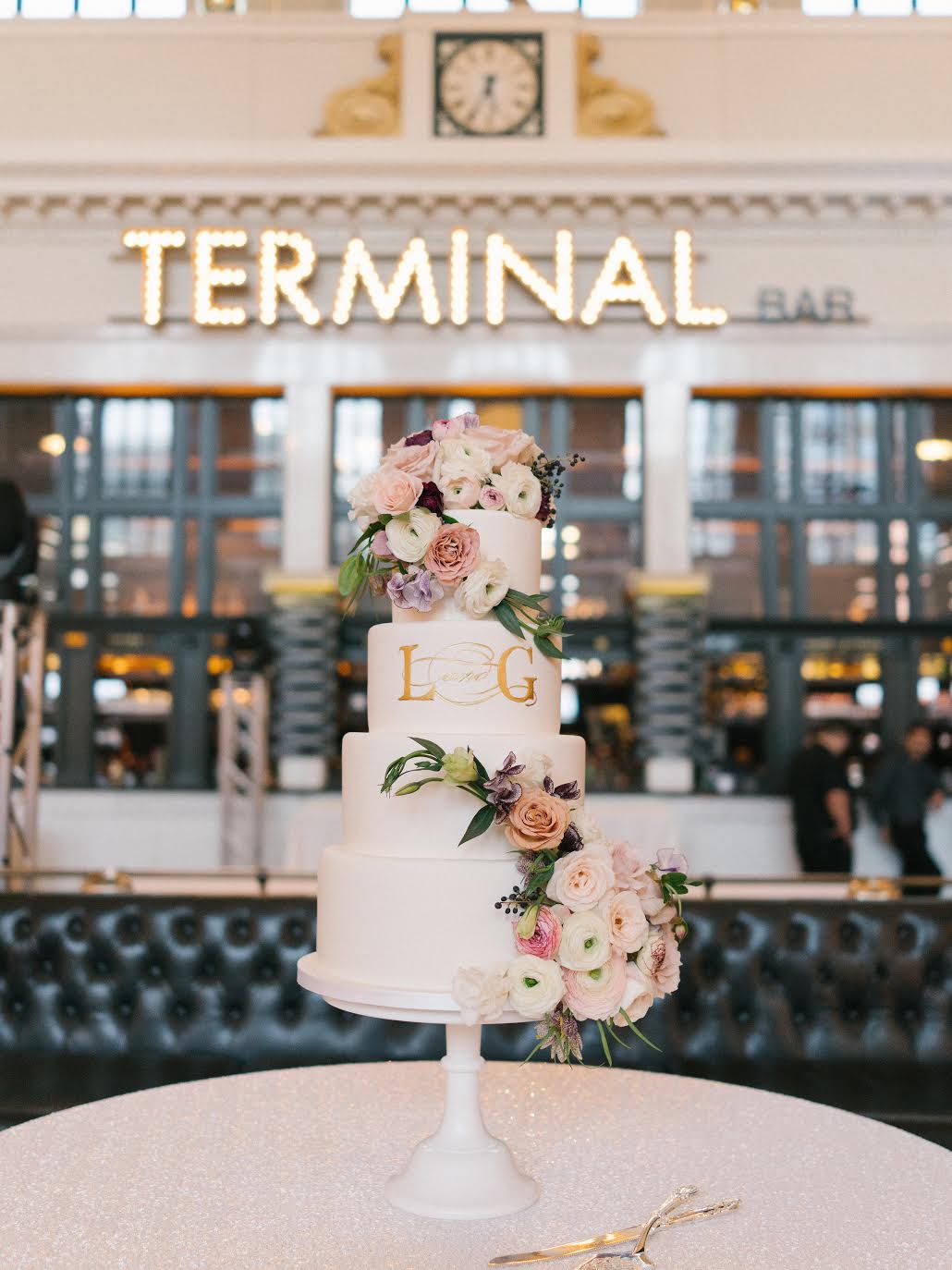 Union Station terminal bar tiered cake with floral lush