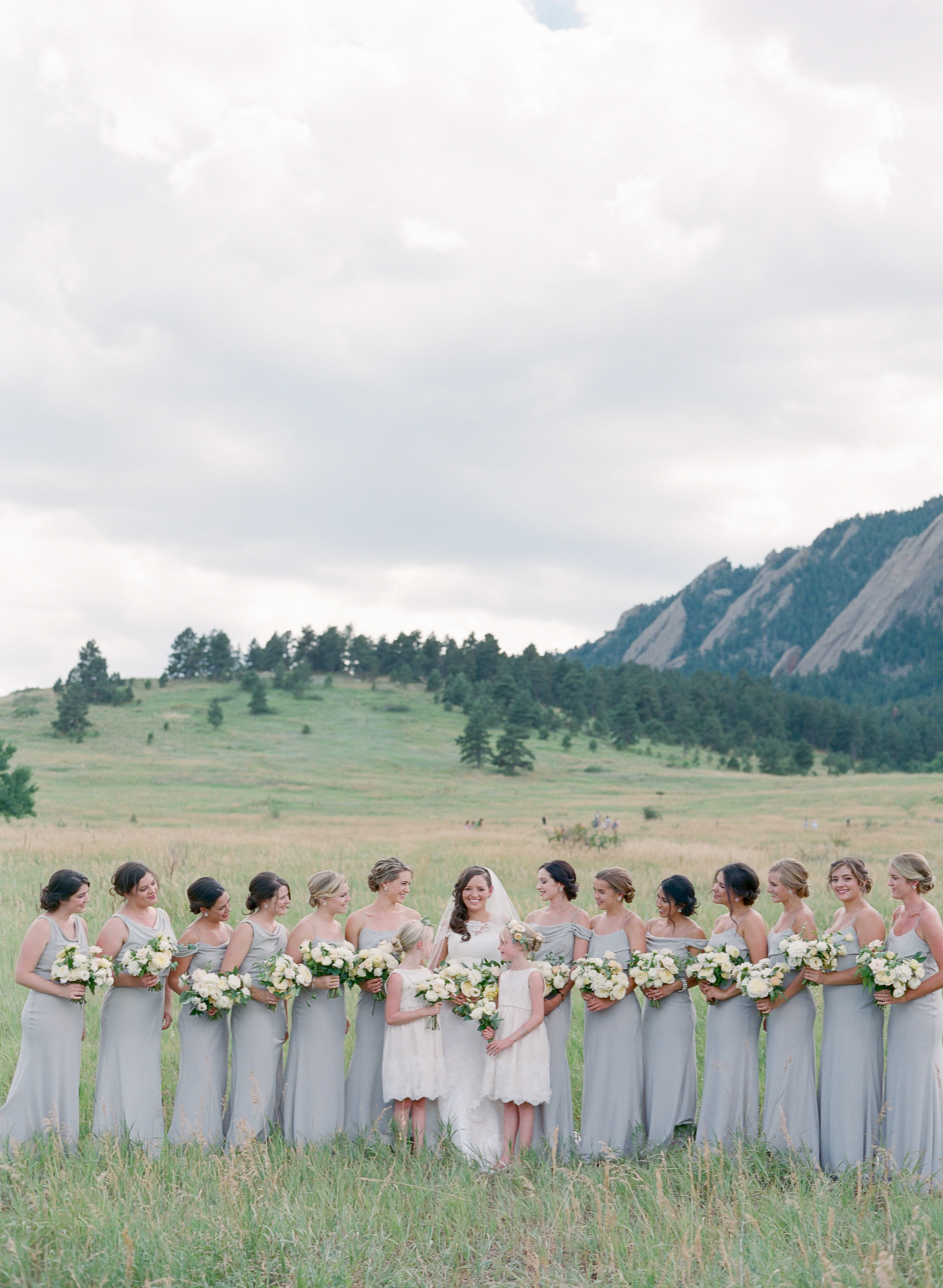 wedding bridal party photo with flower girls outdoors