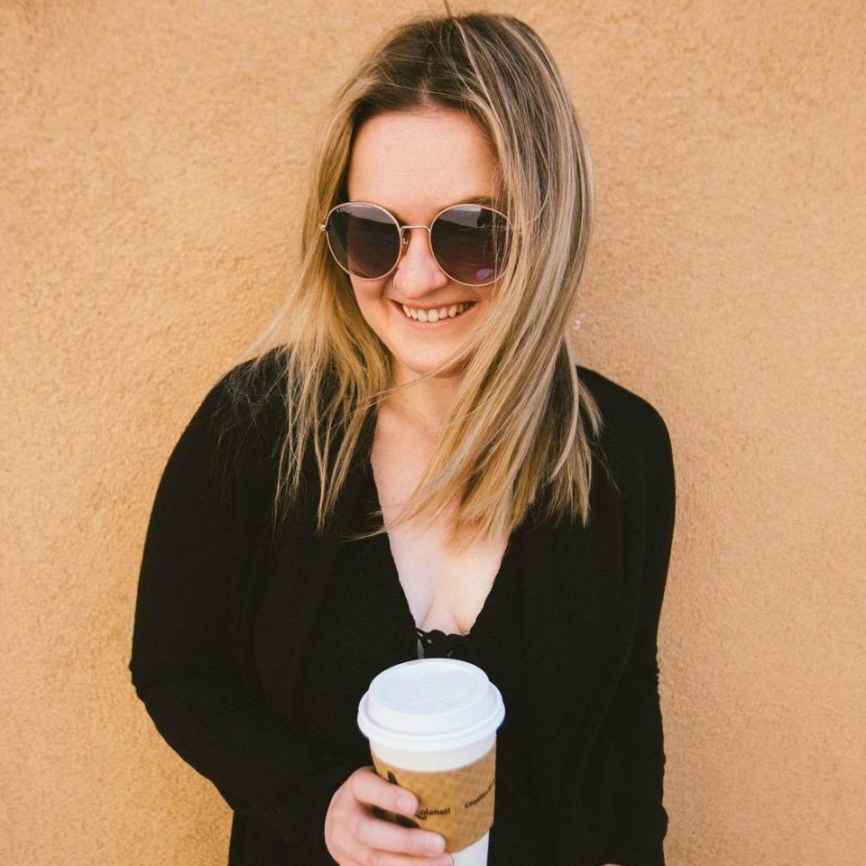 Kristen holding coffee Calluna Crew Lead