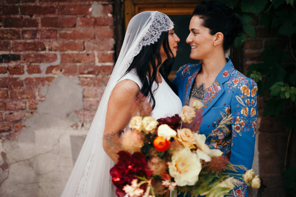 Couple brides blue suit flowers veil